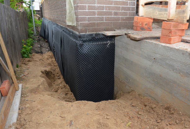 Happy homeowners after waterproofing job in Clementon